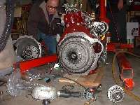 Flywheel and clutch assembled on engine