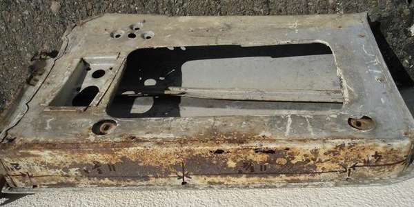 Drain holes in bottom of door shell