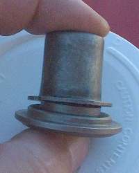 oil deflector and vavle spring retainer. together