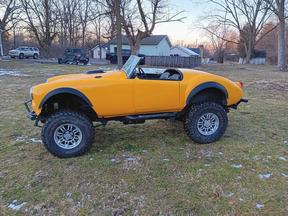 Jeep chassis with MGA body